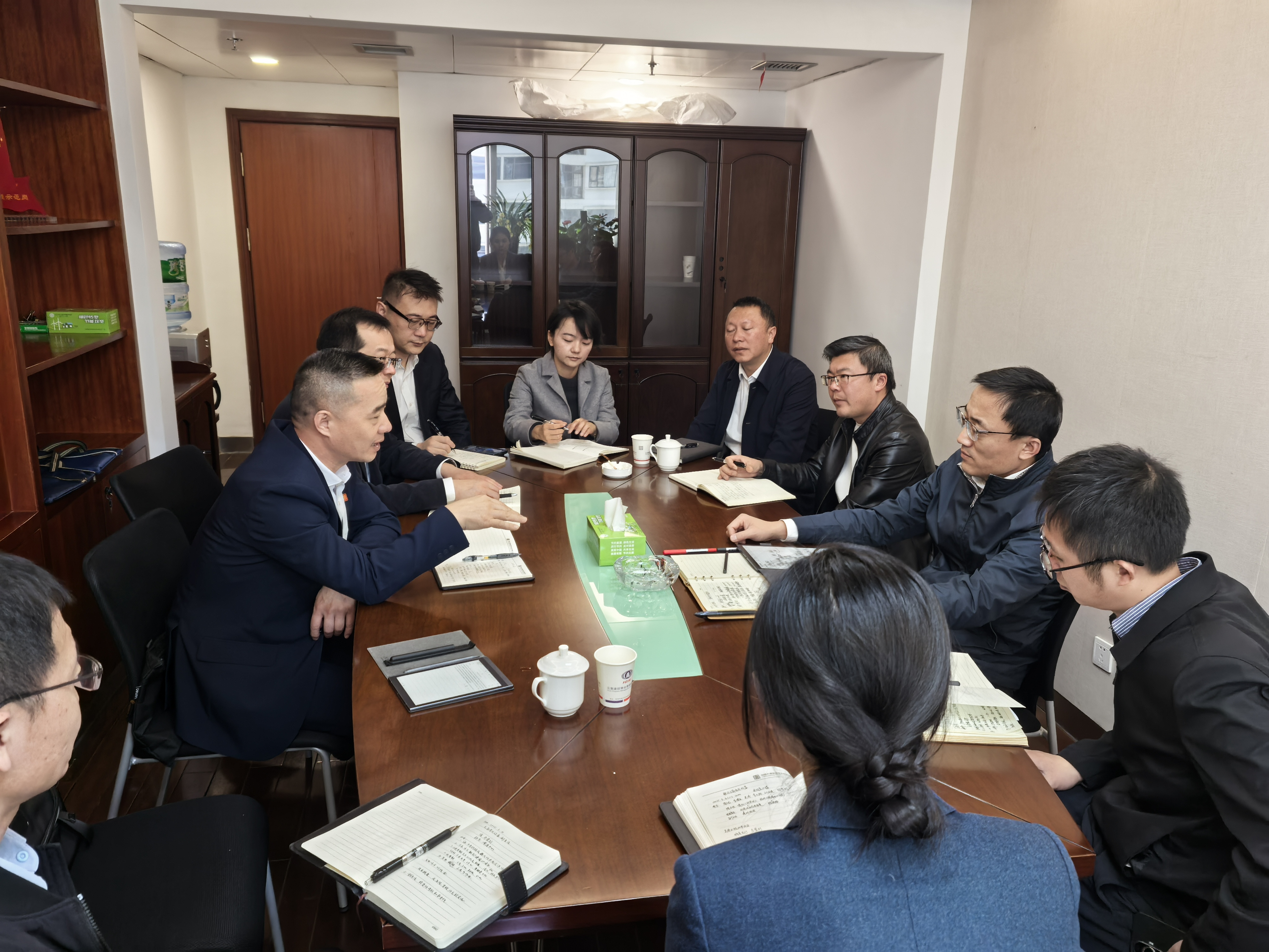 周元龙带队拜访云南发改委党组成员、副主任程坤.jpg