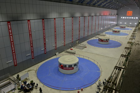 大渡河畔展宏图黄金坪上立新功黄金坪水电站一年四投纪实